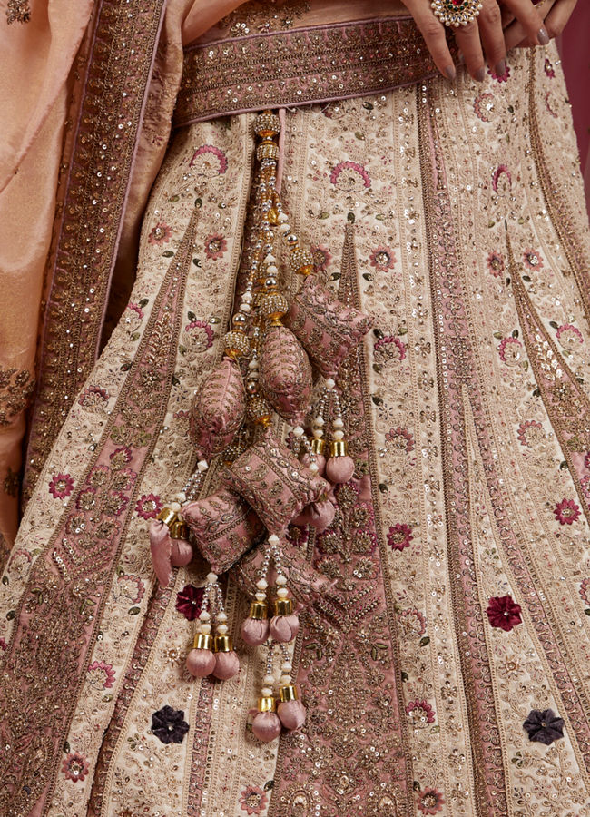Mohey Women Soft Cream Linear Patterned Lehenga with Rhinestone And Sequin Work