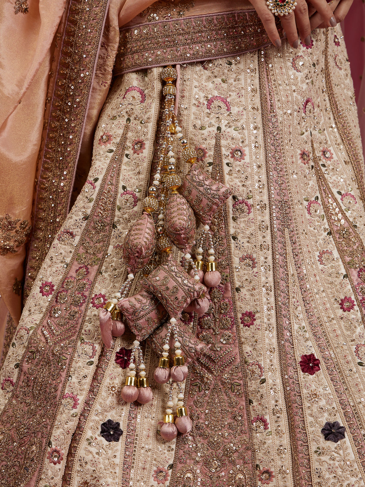 Mohey Women Soft Cream Linear Patterned Lehenga with Rhinestone And Sequin Work