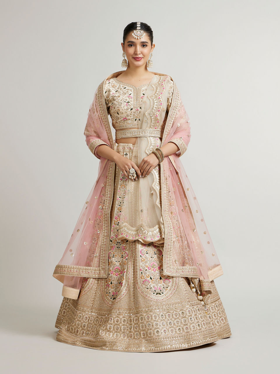 Mohey Women Soft Cream Floral Embroidered Lehenga with Sequin Work And Pillow Trim Latkans