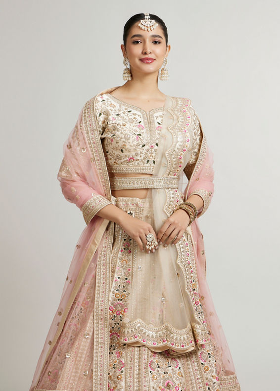 Mohey Women Soft Cream Floral Embroidered Lehenga with Sequin Work And Pillow Trim Latkans