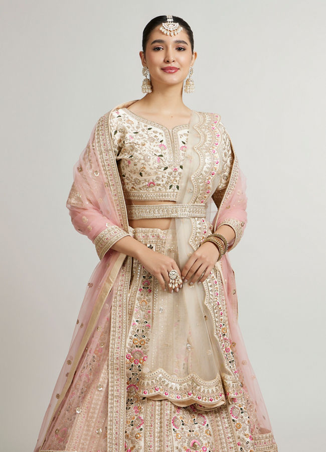 Mohey Women Soft Cream Floral Embroidered Lehenga with Sequin Work and Pillow Trim Latkans image number 1