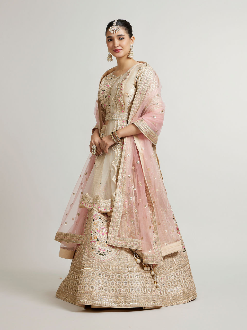 Mohey Women Soft Cream Floral Embroidered Lehenga with Sequin Work And Pillow Trim Latkans