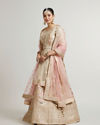 Mohey Women Soft Cream Floral Embroidered Lehenga with Sequin Work And Pillow Trim Latkans