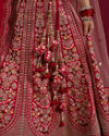 Mohey Women Rani Pink Floral Embroidered Lehenga with Sequin Work And Pillow Trim Latkans