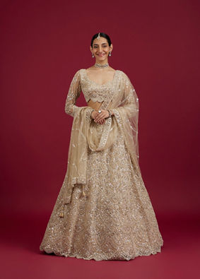 Mohey Women Soft Beige Scallop Patterned Lehenga with Sequin Embroidery And Potli Trim Latkans