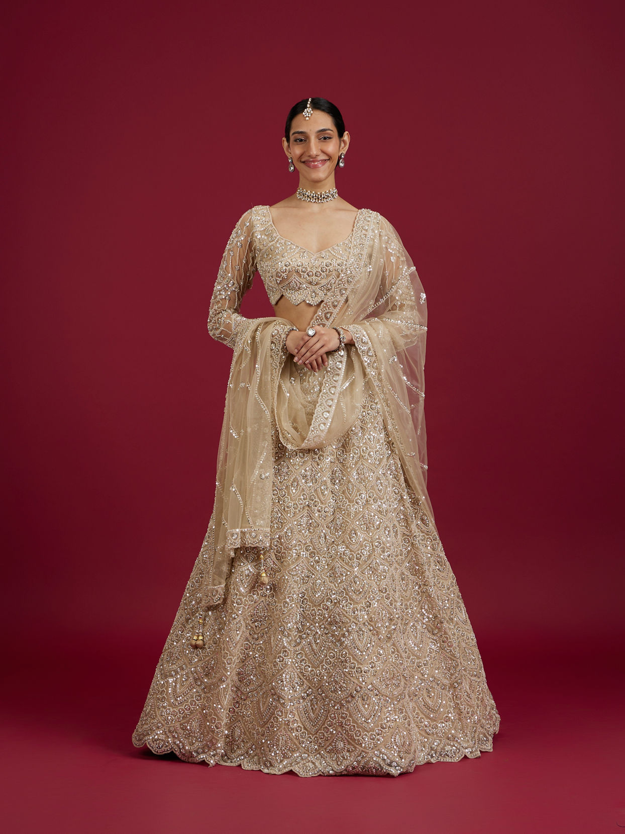 Mohey Women Soft Beige Scallop Patterned Lehenga with Sequin Embroidery And Potli Trim Latkans