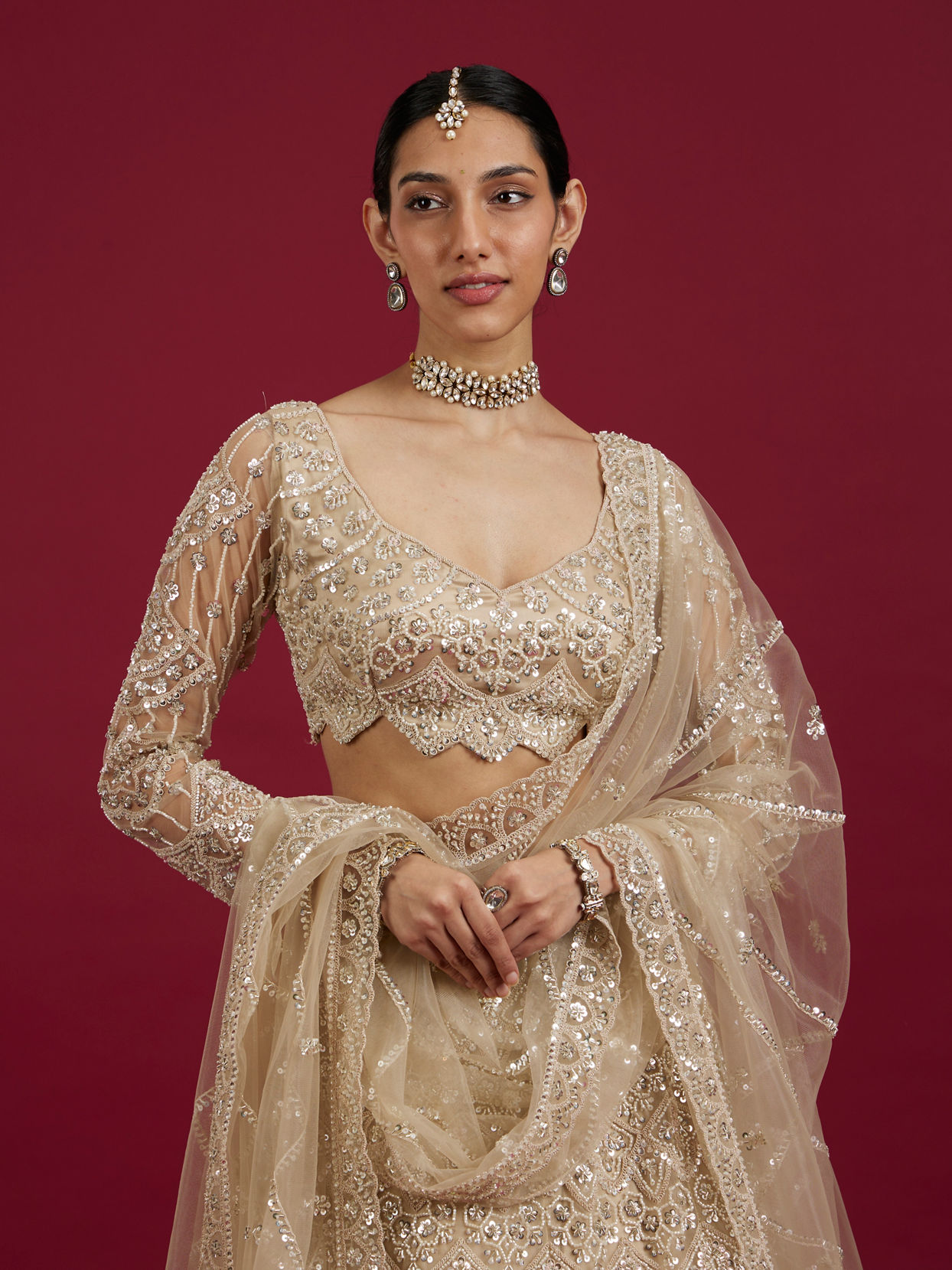 Mohey Women Soft Beige Scallop Patterned Lehenga with Sequin Embroidery And Potli Trim Latkans