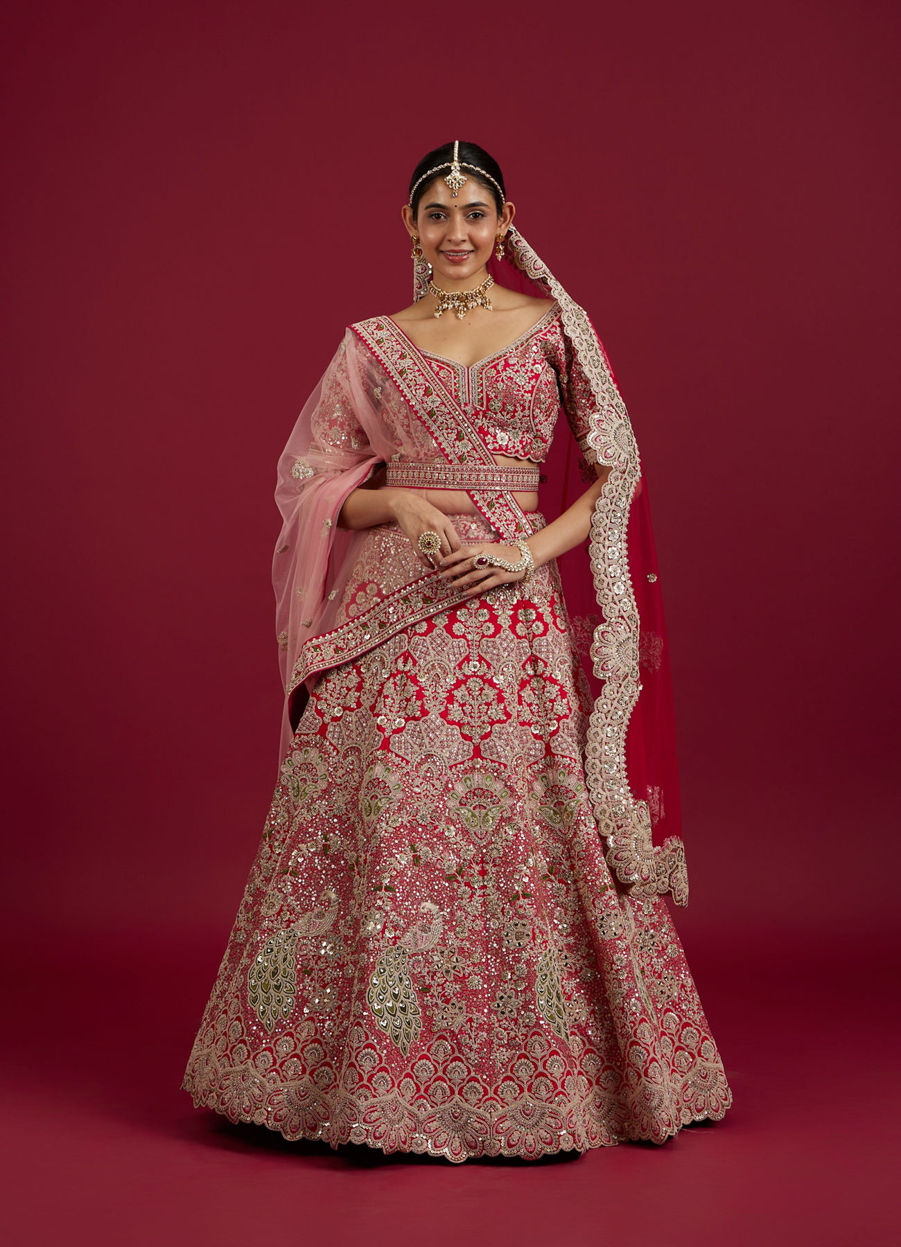 Mohey Women Scarlet Red Embroidered Lehenga with Stone Work, Peacock and Bel Buti Motifs