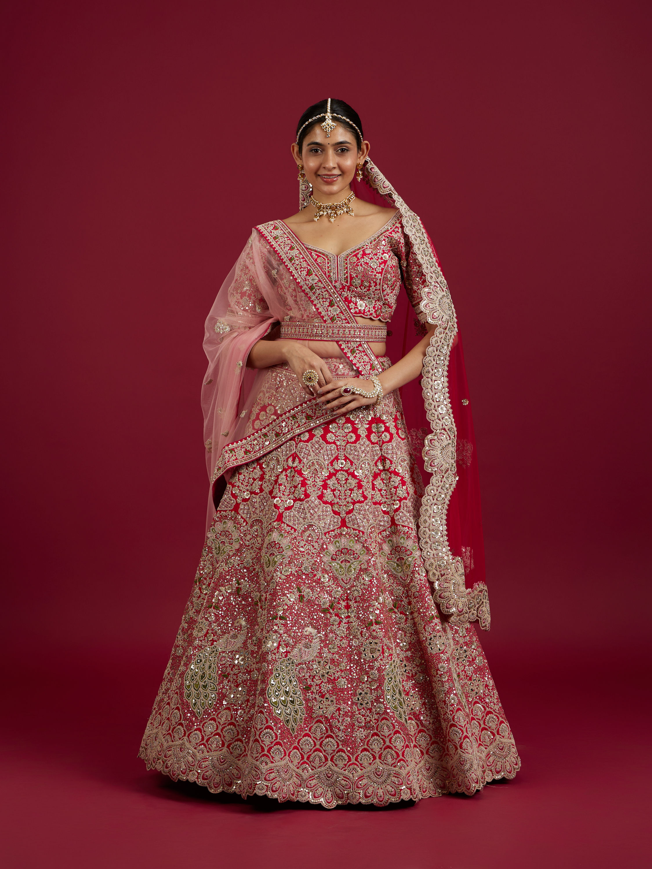 Mohey Women Scarlet Red Embroidered Lehenga with Stone Work, Peacock And Bel Buti Motifs