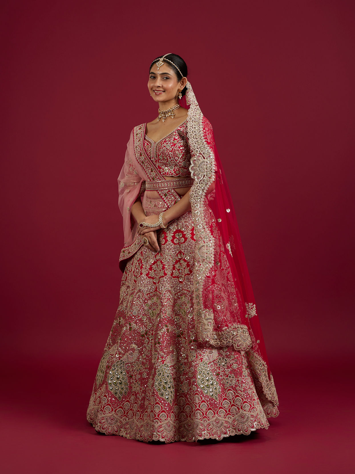 Mohey Women Scarlet Red Embroidered Lehenga with Stone Work, Peacock And Bel Buti Motifs