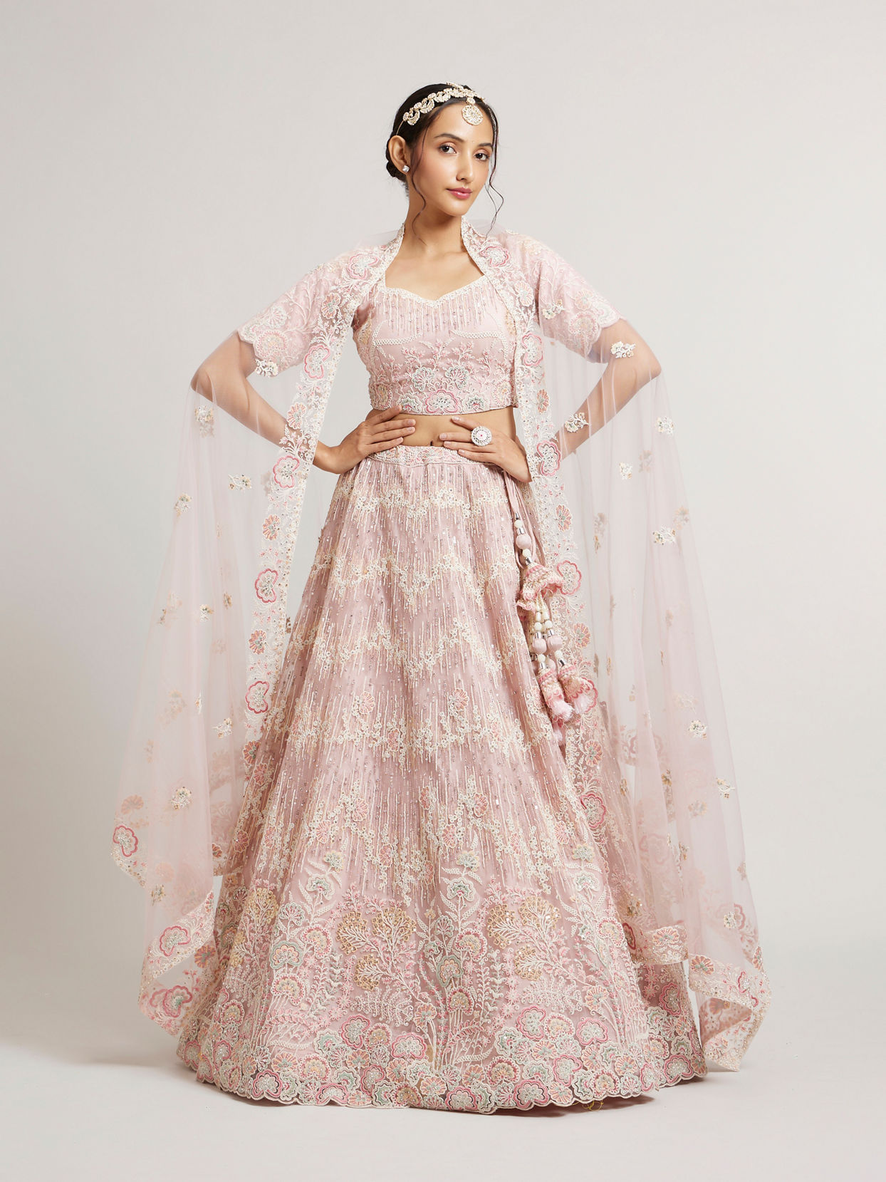 alt message - Mohey Women Blush Pink Floral Embroidered Lehenga with Sequin and Rhinestone Embellishment image number 0