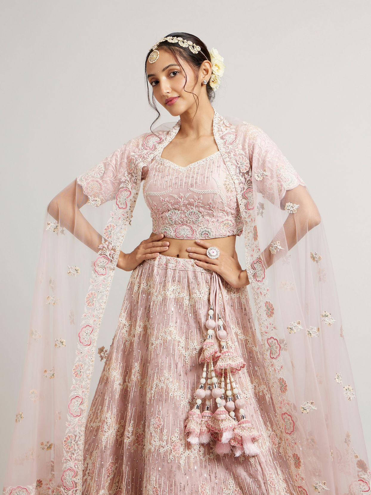 alt message - Mohey Women Blush Pink Floral Embroidered Lehenga with Sequin and Rhinestone Embellishment image number 1