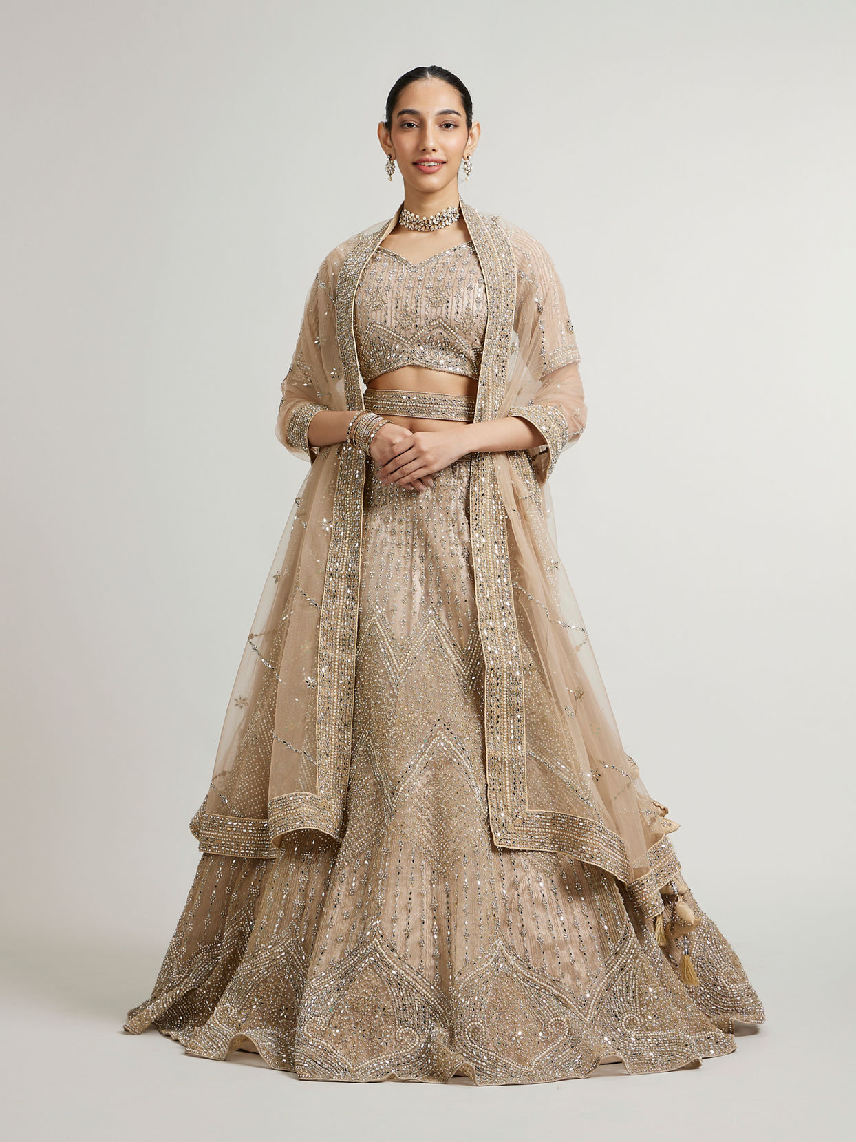 Mohey Women Soft Fawn Chevron Patterned Lehenga with Cutdana, Sequin And Mirror Work
