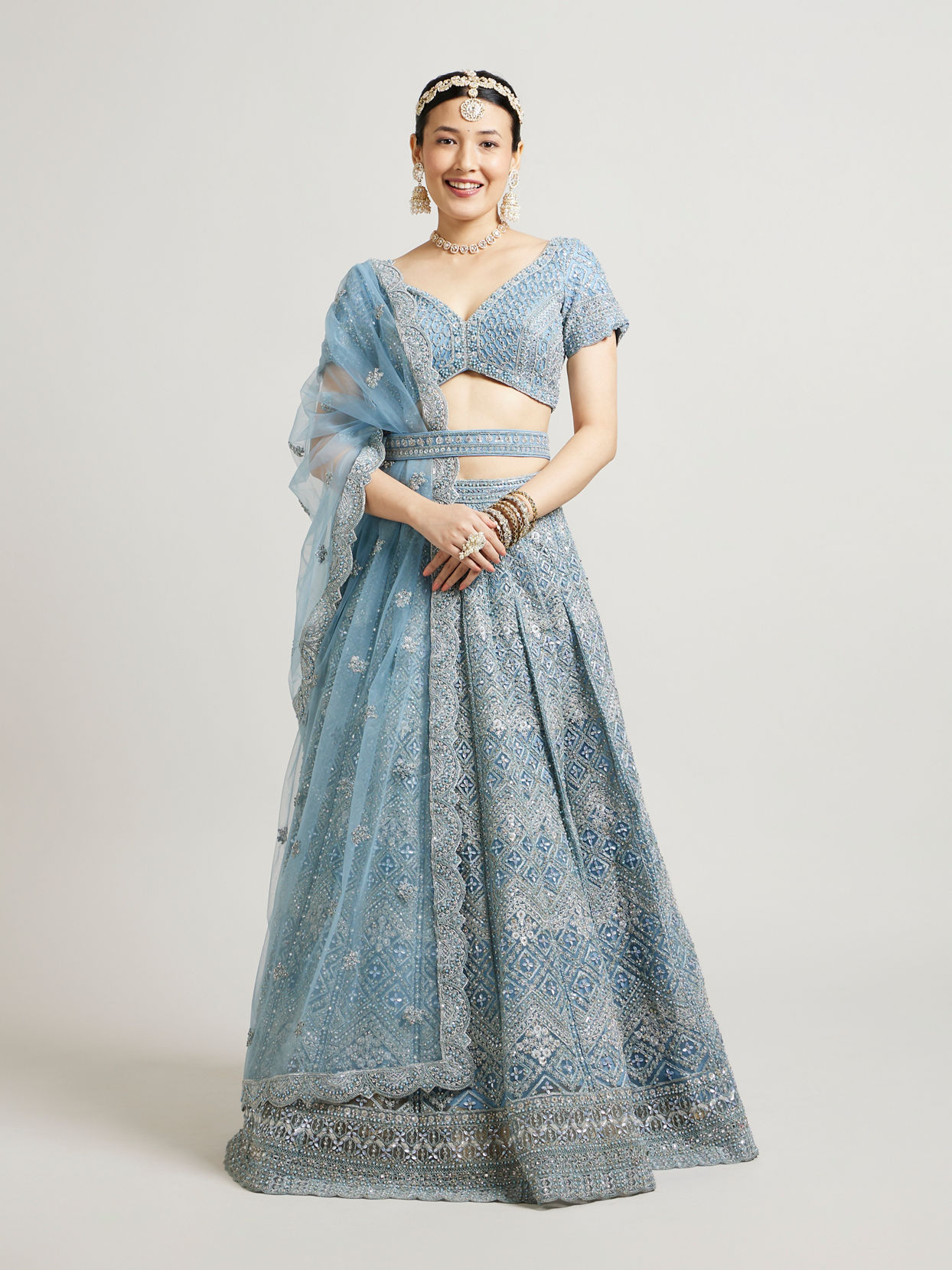 alt message - Mohey Women Ethereal Blue Net Lehenga image number 0