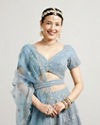 alt message - Mohey Women Ethereal Blue Net Lehenga image number 1