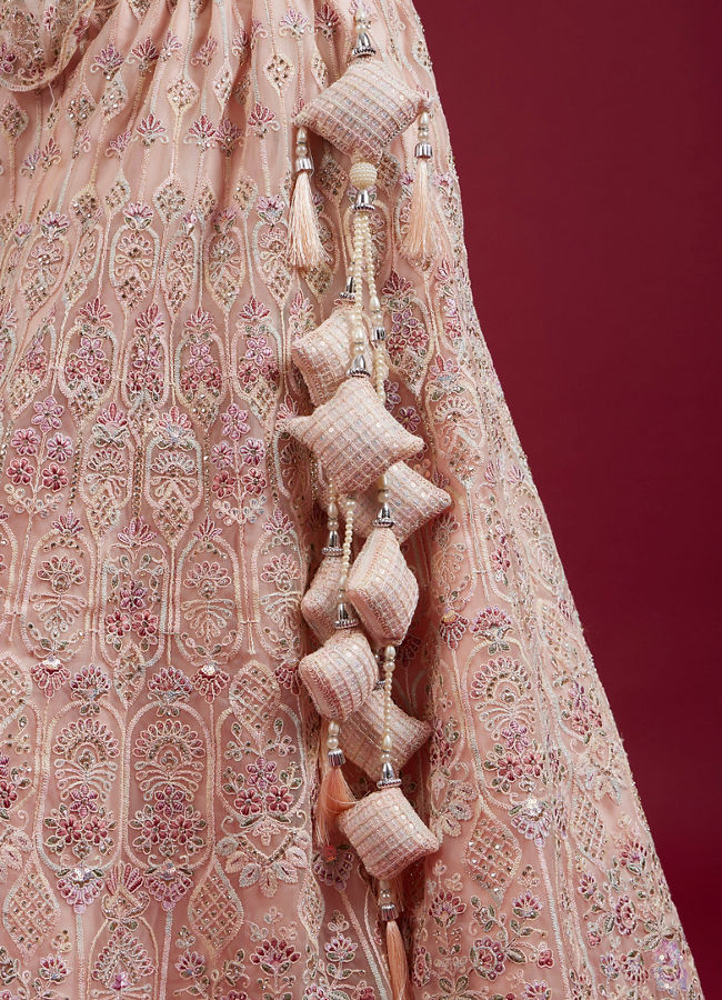 Mohey Women Blushful Pink Net Ensemble Lehenga