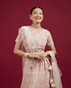 Mohey Women Blushful Pink Net Ensemble Lehenga