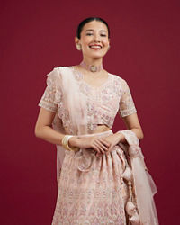 Mohey Women Blushful Pink Net Ensemble Lehenga