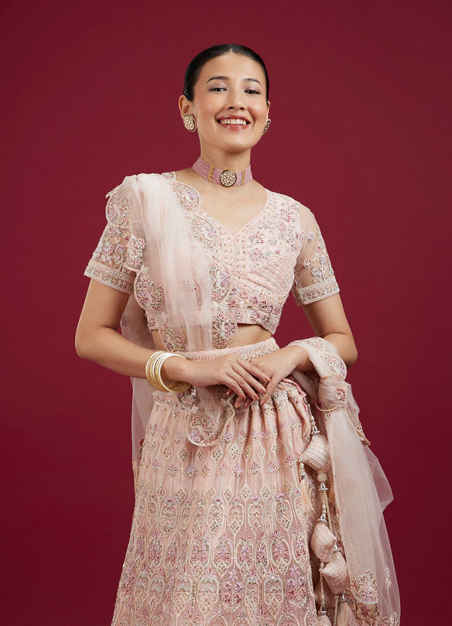 Mohey Women Blushful Pink Net Ensemble Lehenga