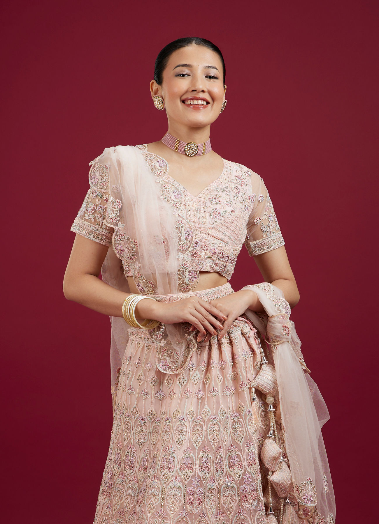 Mohey Women Blushful Pink Net Ensemble Lehenga