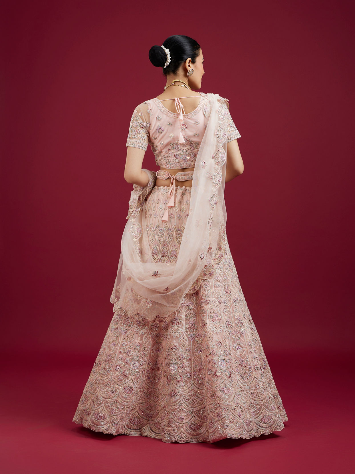 Mohey Women Blushful Pink Net Ensemble Lehenga