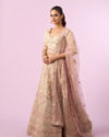 Mohey Women Enthralling Pink Cream Bridal Lehenga