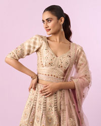 Mohey Women Enthralling Pink Cream Bridal Lehenga