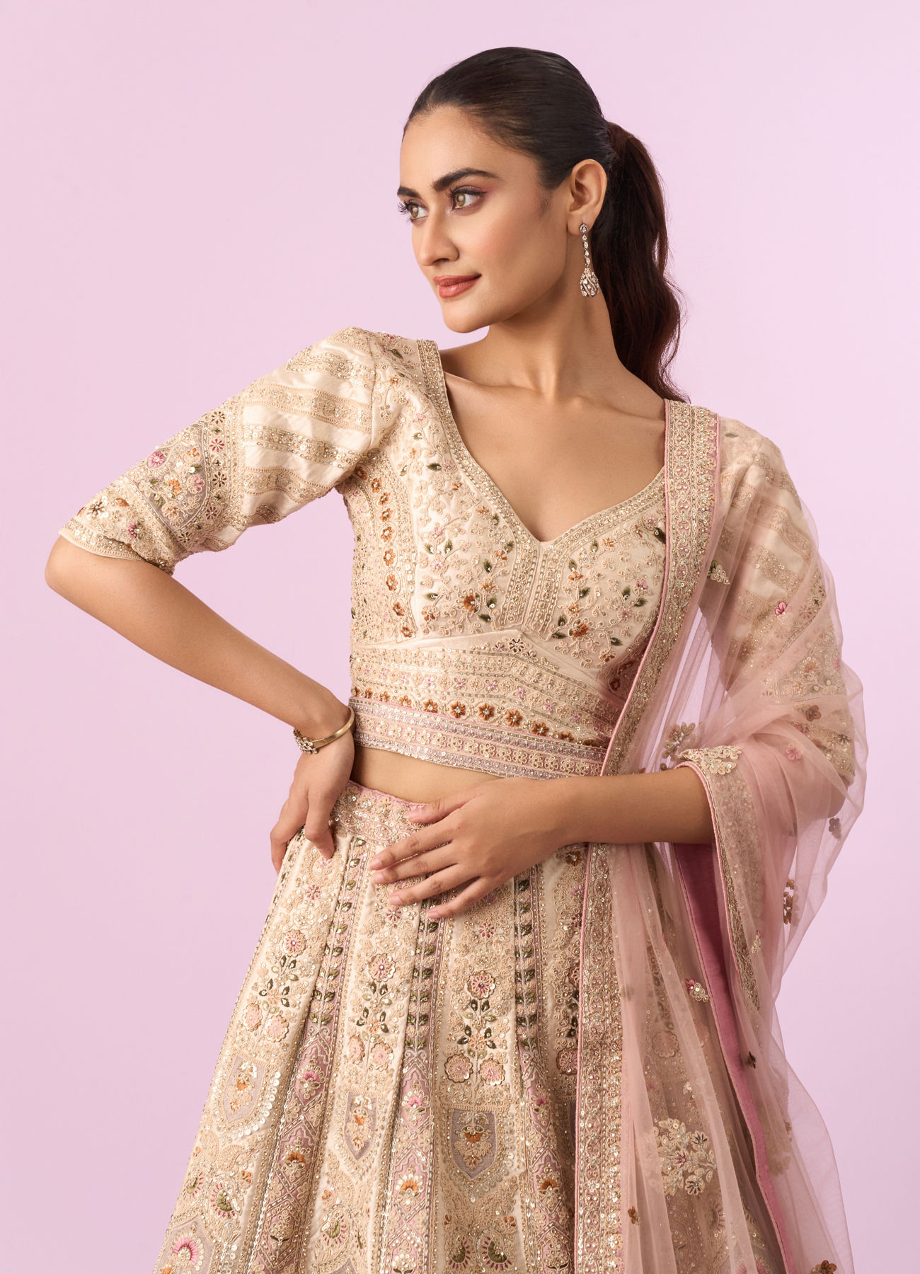 Mohey Women Enthralling Pink Cream Bridal Lehenga
