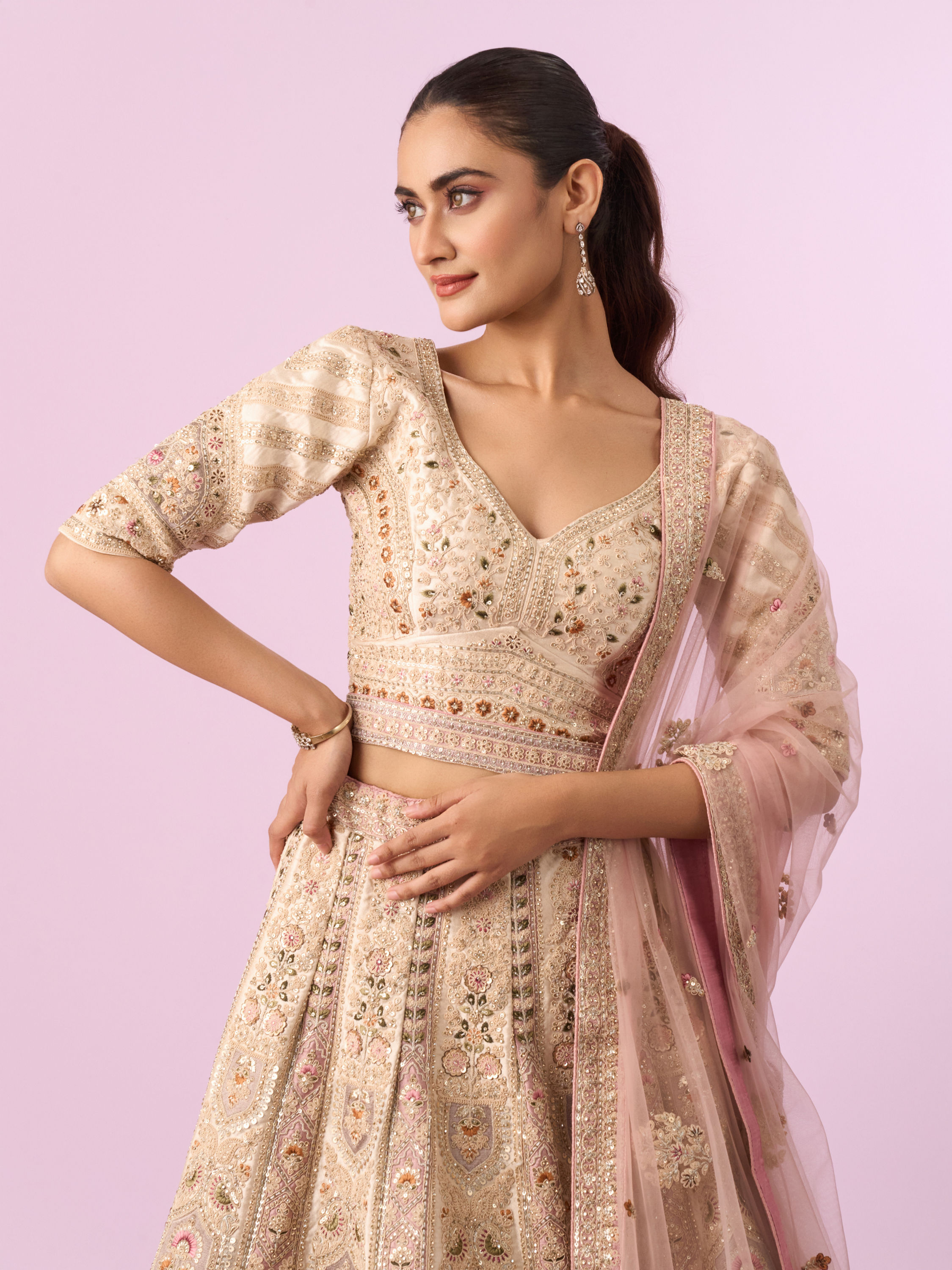 Mohey Women Enthralling Pink Cream Bridal Lehenga