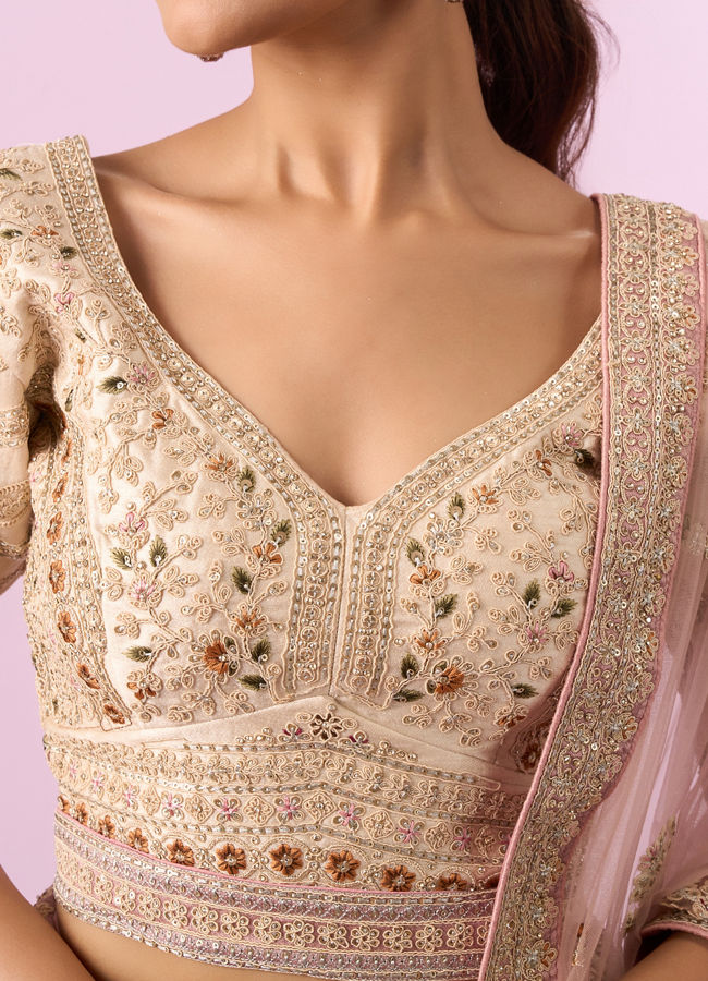 Mohey Women Enthralling Pink Cream Bridal Lehenga