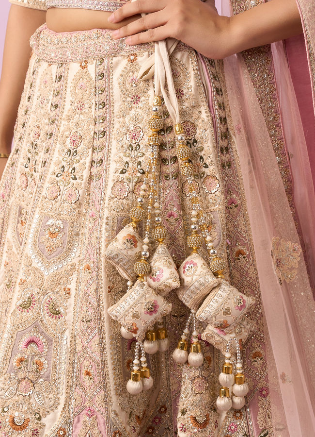 Mohey Women Enthralling Pink Cream Bridal Lehenga