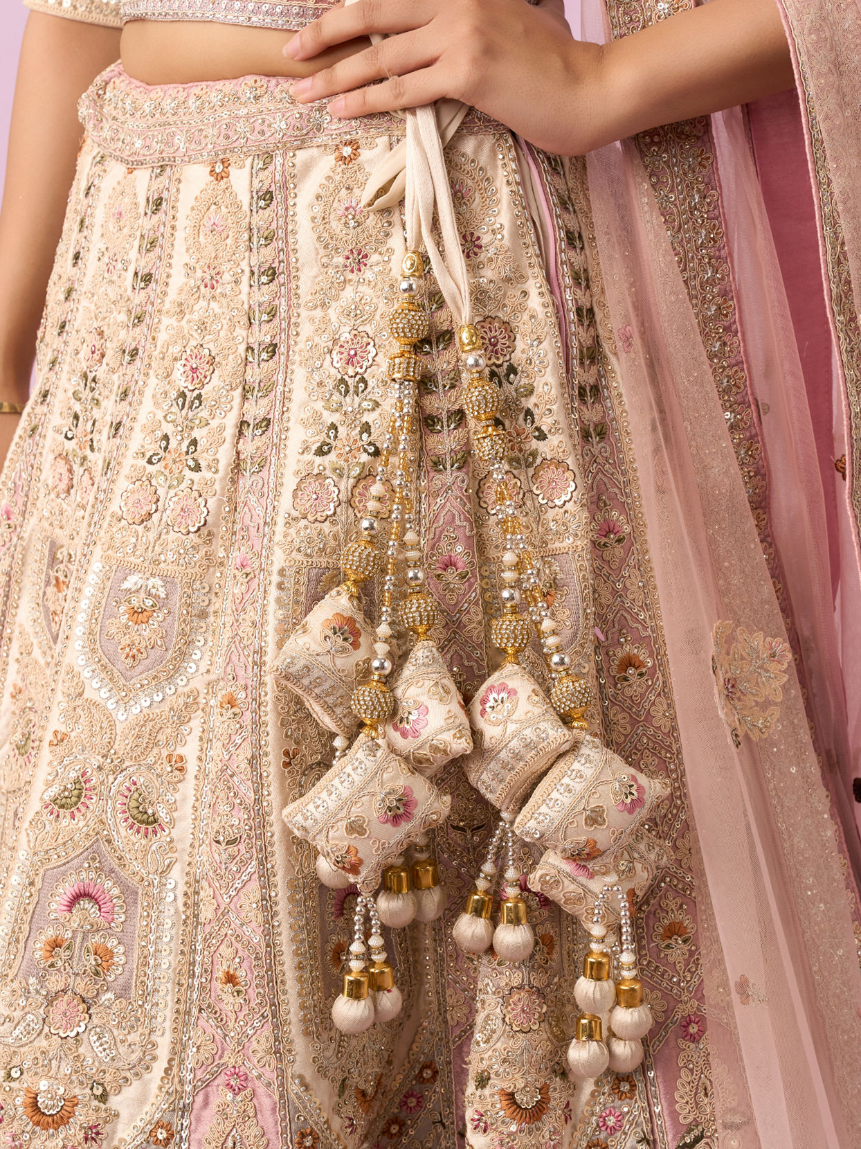 Mohey Women Enthralling Pink Cream Bridal Lehenga