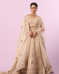 Mohey Women Cream Art Silk Bridal Lehenga with Latkan Belt