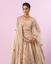 Mohey Women Cream Art Silk Bridal Lehenga with Latkan Belt