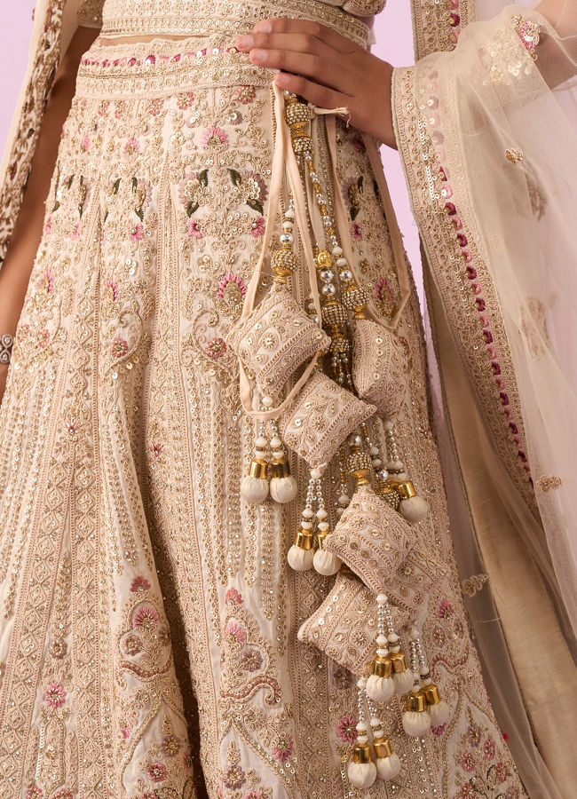 Mohey Women Cream Art Silk Bridal Lehenga with Latkan Belt