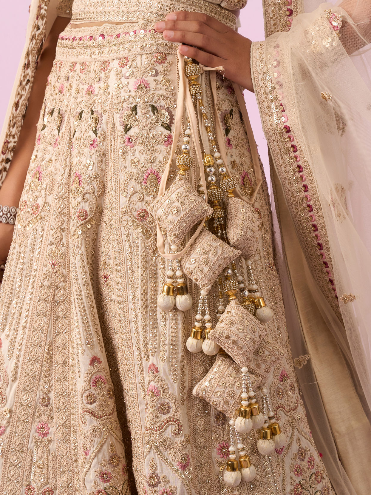 Mohey Women Cream Art Silk Bridal Lehenga with Latkan Belt