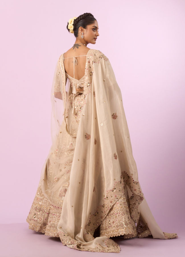 Mohey Women Cream Art Silk Bridal Lehenga with Latkan Belt