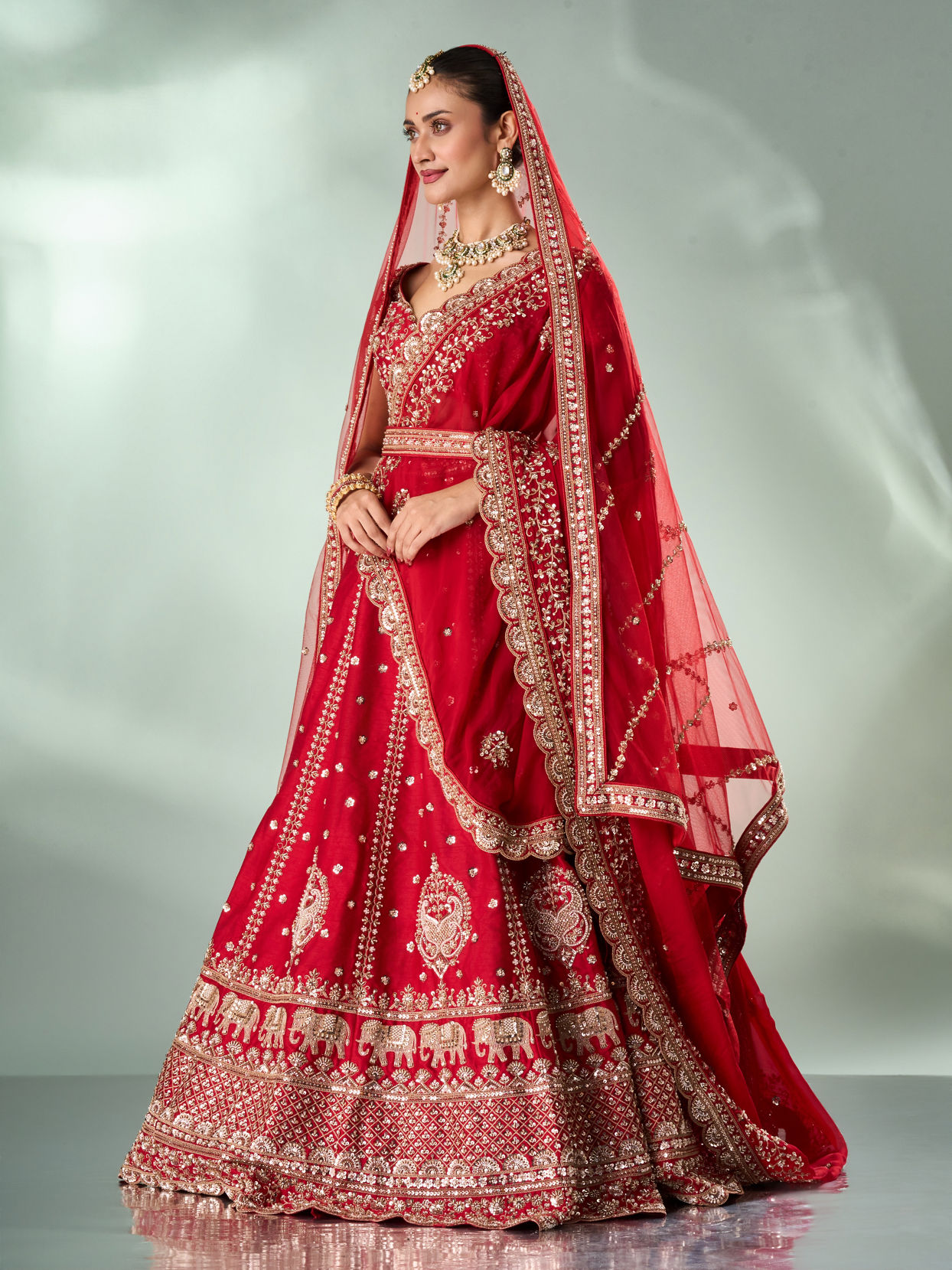 Mohey Women Red Silk Bridal Lehenga with Zari Work