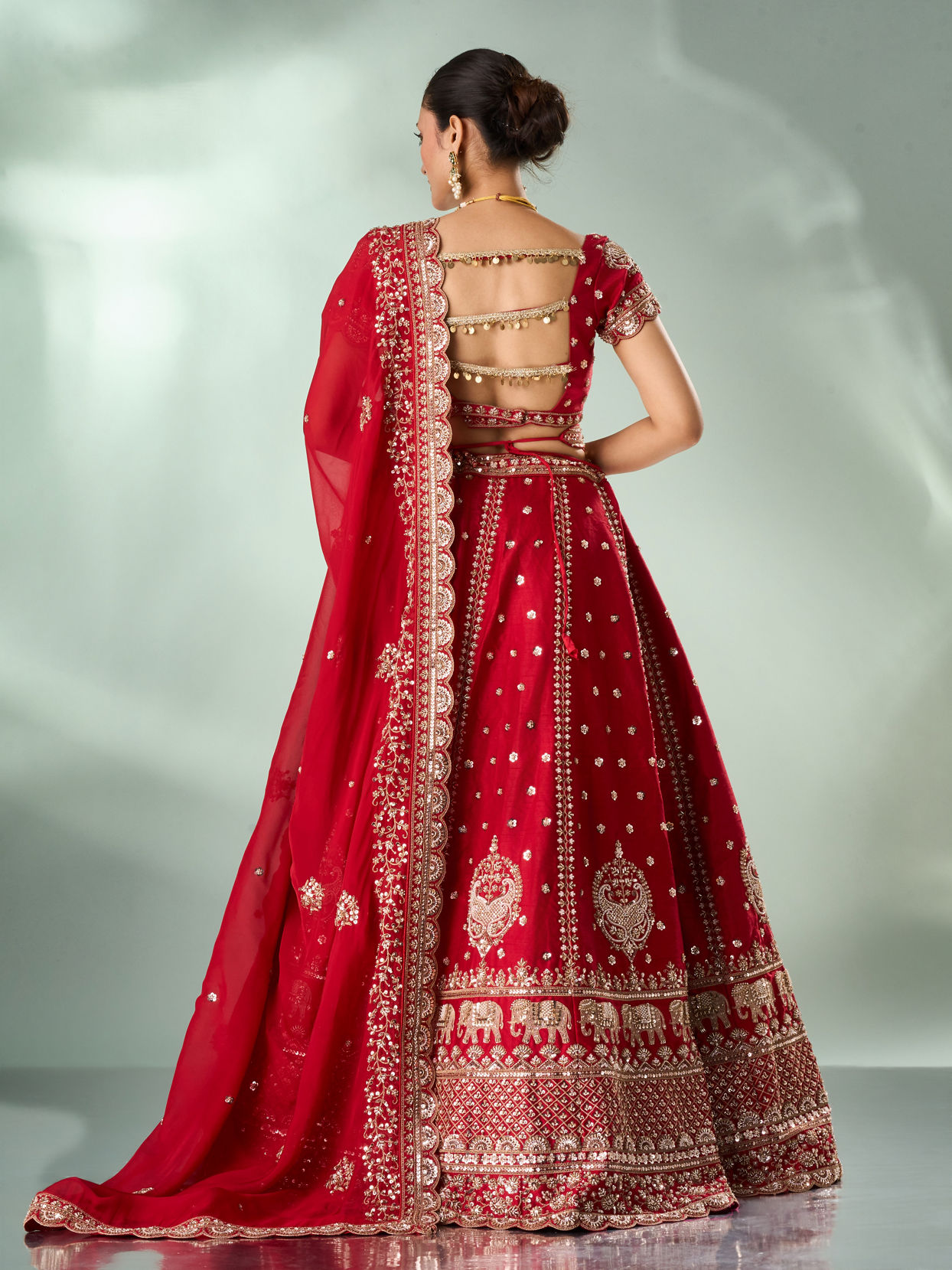 Mohey Women Red Silk Bridal Lehenga with Zari Work
