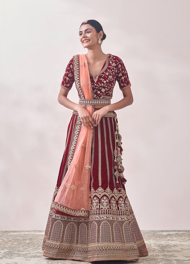 alt message - Mohey Women Cabernet Red Botanical Patterned Bridal Lehenga image number 0