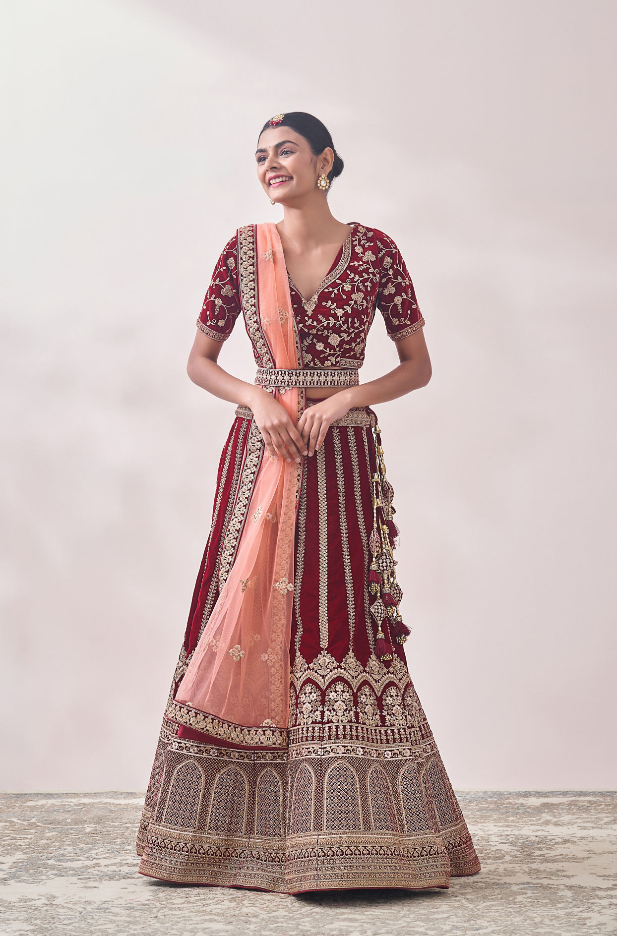 alt message - Mohey Women Cabernet Red Botanical Patterned Bridal Lehenga image number 0