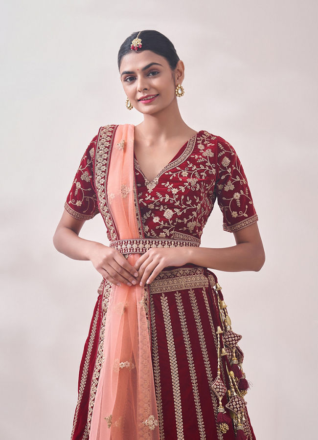 alt message - Mohey Women Cabernet Red Botanical Patterned Bridal Lehenga image number 1