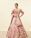 alt message - Mohey Women Berry Pink Floral Embroidered Bridal Lehenga image number 0