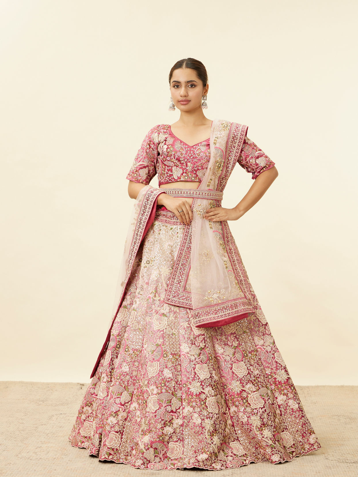 alt message - Mohey Women Berry Pink Floral Embroidered Bridal Lehenga image number 0