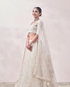 alt message - Mohey Women Buttercream Bel Buti Patterned Lehenga image number 2