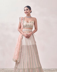 Mohey Women Pearled Ivory Linear Patterned Bridal Lehenga