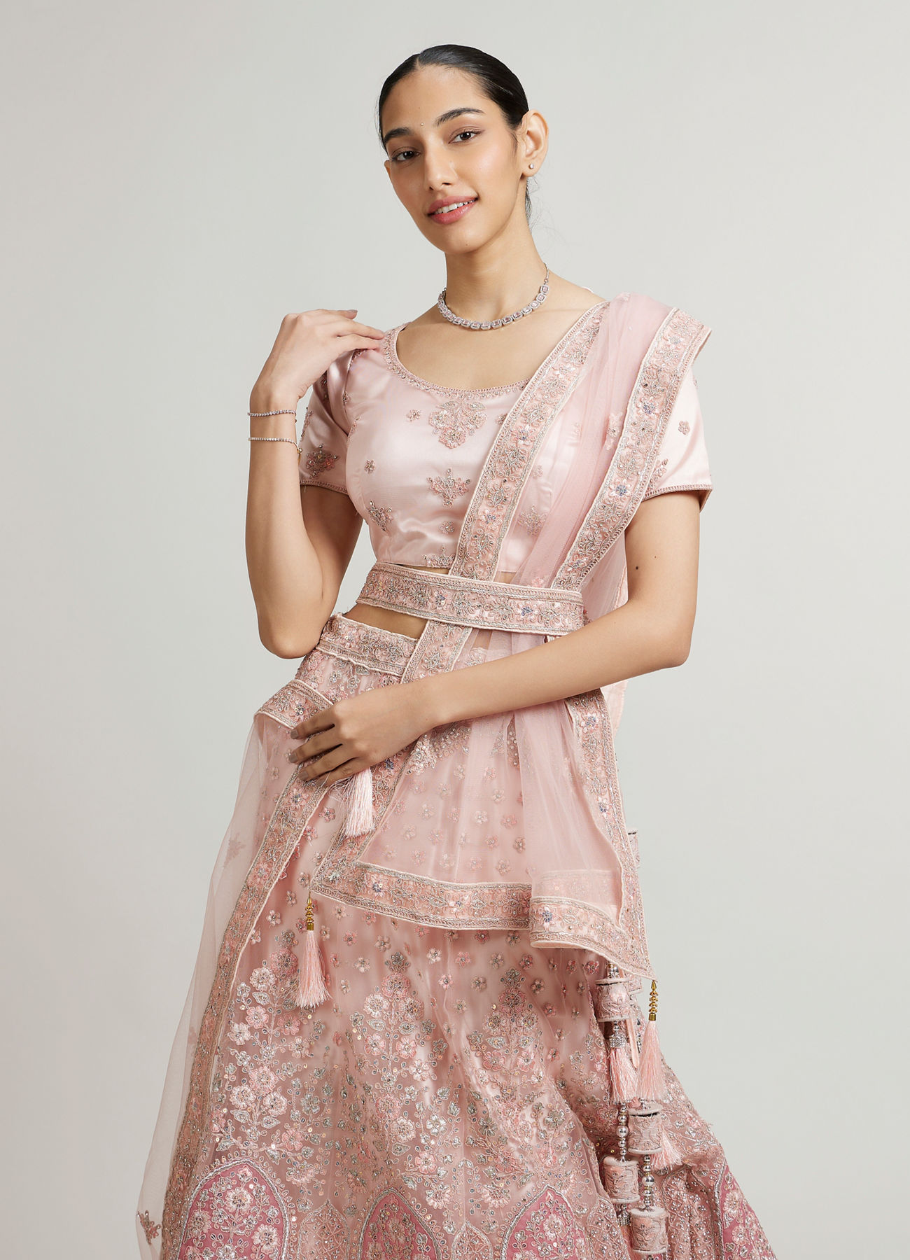 Mohey Women Baby Pink Floral Jaal Patterned Lehenga with Sequin & Stone Work