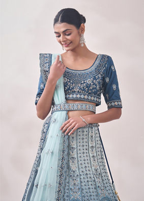 alt message - Mohey Women Coral Blue Floral Art Nouveau Patterned Bridal Lehenga image number 2