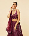 alt message - Mohey Women Windsor Wine Heavy Sequined Lehenga image number 1