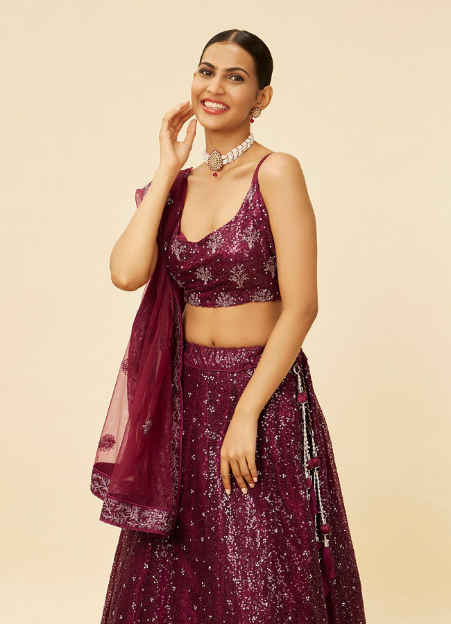 alt message - Mohey Women Windsor Wine Heavy Sequined Lehenga image number 1